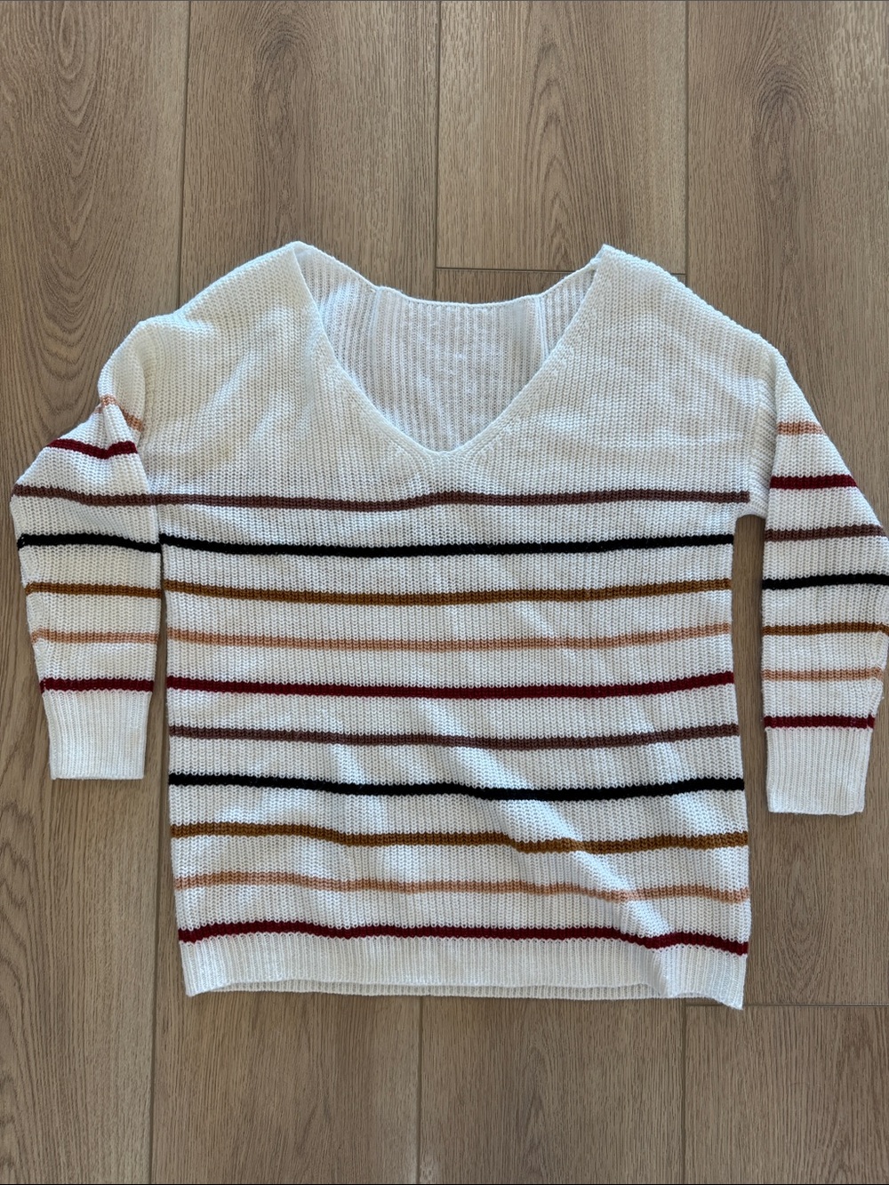 Off-the-Shoulder Cream V-Neck Sweater with Multicolor Stripes